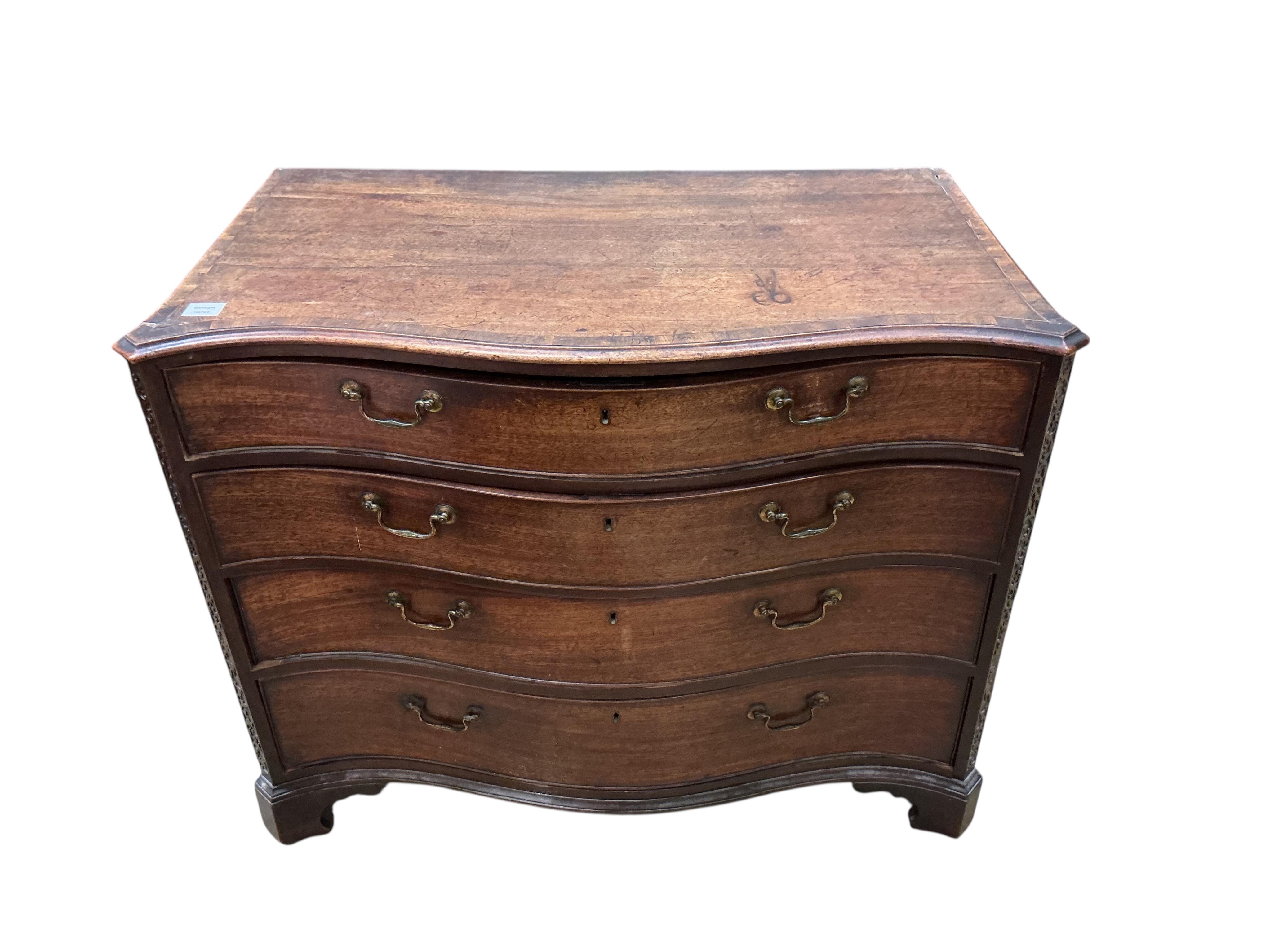 A George III mahogany serpentine chest of four drawers, width 105cm, depth 59cm, height 82cm